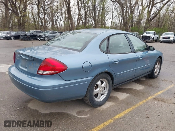 2005 Ford Taurus SE with VIN 1FAFP53U95A227003, listed as a IAAI auction lot 41927903 with 182,402 mi miles and . Bid and sale history available at DreamBid. Image 4.