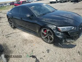 2019 Audi RS 5 Sportback z VIN WUABWCF55KA901621, wystawiony jako Copart lot #67157414 z przebiegiem 99 954 mil mil oraz Szkody całkowita. Historia ofert i sprzedaży dostępna na DreamBid. Obrazek 11.