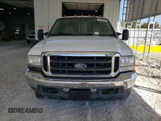 2002 Ford F-350 with VIN 1FDWW37F42EB55737, listed as a Copart auction lot 73678434 with 233,366 mi miles and Salvage title. Bid and sale history available at DreamBid. Image 5.
