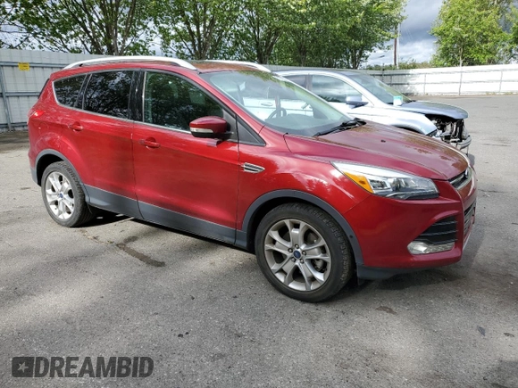 2015 Ford Escape Titanium with VIN 1FMCU9J94FUB92166, listed as a Copart auction lot 61371055 with 96,439 mi miles and Salvage title. Bid and sale history available at DreamBid. Image 4.