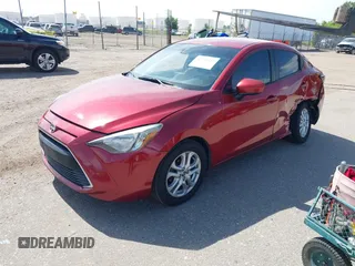 2016 Scion iA z VIN 3MYDLBZV0GY118621, wystawiony jako IAAI lot #42342512 z przebiegiem 71 193 mil mil oraz . Historia ofert i sprzedaży dostępna na DreamBid. Obrazek 2.