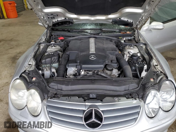 2003 Mercedes-Benz SL 500 z VIN WDBSK75FX3F061879, wystawiony jako Copart lot #55930265 z przebiegiem 117 824 mil mil oraz Tytuł czysty. Historia ofert i sprzedaży dostępna na DreamBid. Obrazek 11.
