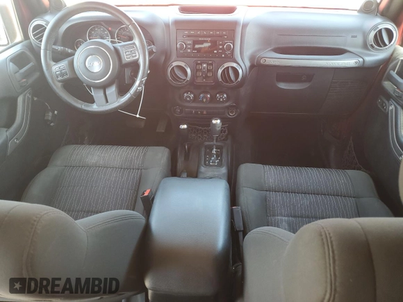 2012 Jeep Wrangler Unlimited Sport z VIN 1C4BJWDG7CL214633, wystawiony jako Copart lot #54547655 z przebiegiem 80 720 mil mil oraz Szkoda całkowita • Salvage title. Historia ofert i sprzedaży dostępna na DreamBid. Obrazek 8.