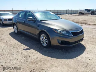 2013 Kia Optima LX with VIN 5XXGM4A74DG093454, listed as a IAAI auction lot 42004990 with 176,667 mi miles. Bid and sale history available at carsss.com. Image 1.