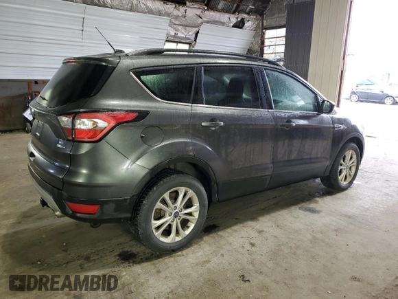 2018 Ford Escape SE z VIN 1FMCU9GD7JUA68705, wystawiony jako Copart lot #58275145 z przebiegiem 200 695 mil mil oraz Tytuł czysty. Historia ofert i sprzedaży dostępna na DreamBid. Obrazek 3.