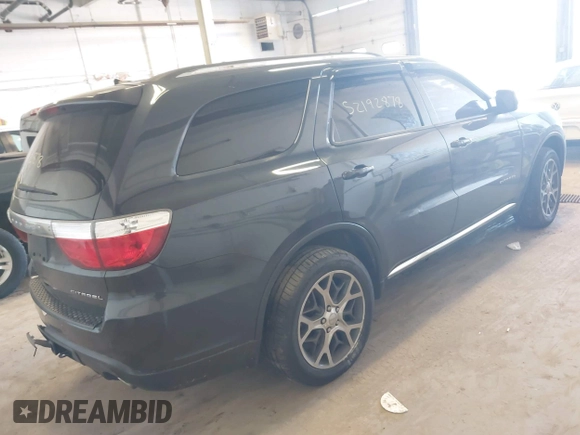 2013 Dodge Durango Citadel with VIN 1C4SDJET2DC529573, listed as a IAAI auction lot 42192878 with 217,445 mi miles and . Bid and sale history available at DreamBid. Image 4.
