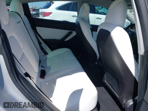 2018 Tesla Model 3 Long Range Battery with VIN 5YJ3E1EB5JF100578, listed as a IAAI auction lot 41959766 with 57,931 mi miles and . Bid and sale history available at DreamBid. Image 8.