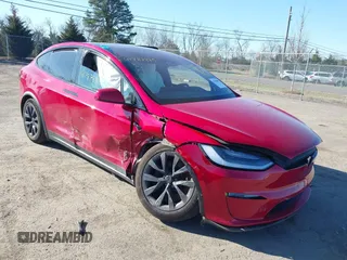 2022 Tesla Model X Plaid z VIN 7SAXCBE62NF355956, wystawiony jako IAAI lot #41787885 z przebiegiem Nie podano mil oraz . Historia ofert i sprzedaży dostępna na DreamBid. Obrazek 1.