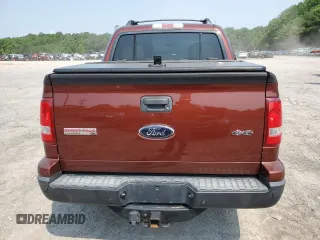 2010 Ford Explorer Sport Trac XLT с VIN 1FMEU5BE6AUA41397, выставлен на аукционе Copart как лот 60508925 с пробегом 167 500 миль миль и Чистый • Clean title. История ставок и продаж доступна на DreamBid. Изображение 6.