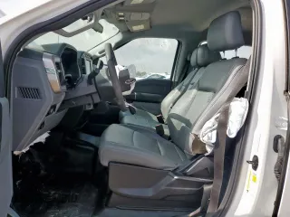 2023 Ford F-150 XL с VIN 1FTEW1CB7PKF35512, выставлен на аукционе Copart как лот 63042965 с пробегом 72 721 миль миль и Списание • Salvage title. История ставок и продаж доступна на DreamBid. Изображение 7.