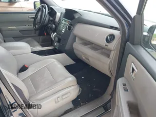 2011 Honda Pilot Touring z VIN 5FNYF3H94BB032105, wystawiony jako IAAI lot #42435522 z przebiegiem 247 899 mil mil oraz . Historia ofert i sprzedaży dostępna na DreamBid. Obrazek 5.
