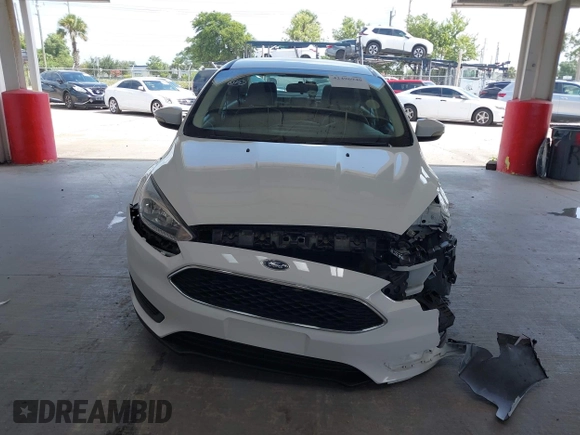 2017 Ford Focus SE with VIN 1FADP3F2XHL342823, listed as a IAAI auction lot 42496940 with 97,263 mi miles and . Bid and sale history available at DreamBid. Image 12.