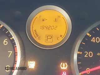 2007 Nissan Sentra 2.0 z VIN 3N1AB61E27L655448, wystawiony jako IAAI lot #41587772 z przebiegiem 184 202 mil mil oraz . Historia ofert i sprzedaży dostępna na DreamBid. Obrazek 15.