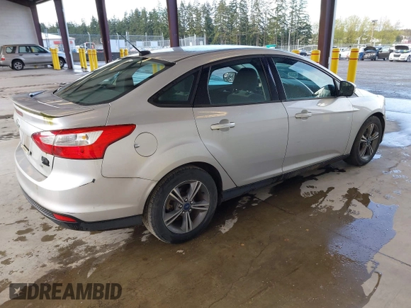 2014 Ford Focus SE with VIN 1FADP3F28EL433519, listed as a IAAI auction lot 41969007 with 137,064 mi miles. Bid and sale history available at carsss.com. Image 4.