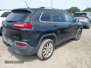 2014 Jeep Cherokee Limited with VIN 1C4PJLDB4EW256137, listed as a IAAI auction lot 42236043 with 145,517 mi miles and . Bid and sale history available at DreamBid. Image 4.