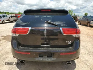 2015 Lincoln MKX z VIN 2LMDJ8JK1FBL31836, wystawiony jako Copart lot #56241005 z przebiegiem 128 613 mil mil oraz Szkoda całkowita • Salvage title. Historia ofert i sprzedaży dostępna na DreamBid. Obrazek 6.