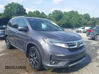 2020 Honda Pilot Touring 7-Passenger with VIN 5FNYF6H67LB006686, listed as a IAAI auction lot 42698135 with Not provided miles and . Bid and sale history available at DreamBid. Image 1.