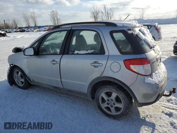 2009 Suzuki SX4 AWD z VIN JS2YB413X95100397, wystawiony jako Copart lot #43039585 z przebiegiem 260 435 mil mil oraz Szkoda całkowita • Salvage title. Historia ofert i sprzedaży dostępna na DreamBid. Obrazek 2.