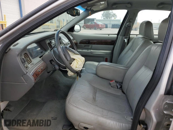 2004 Mercury Grand Marquis LS Premium z VIN 2MEFM75WX4X646351, wystawiony jako Copart lot #56770455 z przebiegiem 190 988 mil mil oraz Szkoda całkowita • Salvage title. Historia ofert i sprzedaży dostępna na DreamBid. Obrazek 7.