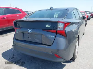 2020 Toyota Prius L Eco z VIN JTDKARFU3L3111990, wystawiony jako IAAI lot #41964834 z przebiegiem 67 873 mil mil oraz . Historia ofert i sprzedaży dostępna na DreamBid. Obrazek 4.