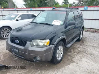 2006 Ford Escape XLT with VIN 1FMYU03156KA84031, listed as a IAAI auction lot 42276336 with 136,038 mi miles and . Bid and sale history available at DreamBid. Image 2.