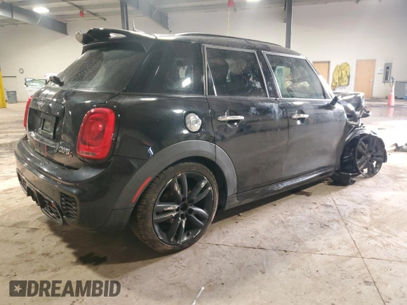2015 MINI Hardtop 4 Door S with VIN WMWXU3C55F2B62019, listed as a Copart auction lot 46853535 with 124,919 mi miles and Salvage title. Bid and sale history available at DreamBid. Image 3.