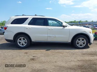 2012 Dodge Durango SXT z VIN 1C4RDJAG0CC294998, wystawiony jako IAAI lot #42230396 z przebiegiem 62 963 mil mil oraz . Historia ofert i sprzedaży dostępna na DreamBid. Obrazek 13.