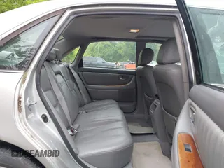 2003 Toyota Avalon XL z VIN 4T1BF28B13U293991, wystawiony jako IAAI lot #42358965 z przebiegiem 142 424 mil mil oraz . Historia ofert i sprzedaży dostępna na DreamBid. Obrazek 8.