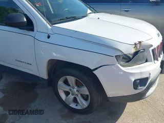 2016 Jeep Compass Sport with VIN 1C4NJCBA7GD705620, listed as a IAAI auction lot 42252671 with 105,903 mi miles and . Bid and sale history available at DreamBid. Image 12.