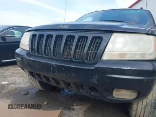 1999 Jeep Grand Cherokee Limited with VIN 1J4GW68S8XC588500, listed as a IAAI auction lot 41484787 with 161,961 mi miles. Bid and sale history available at carsss.com. Image 6.