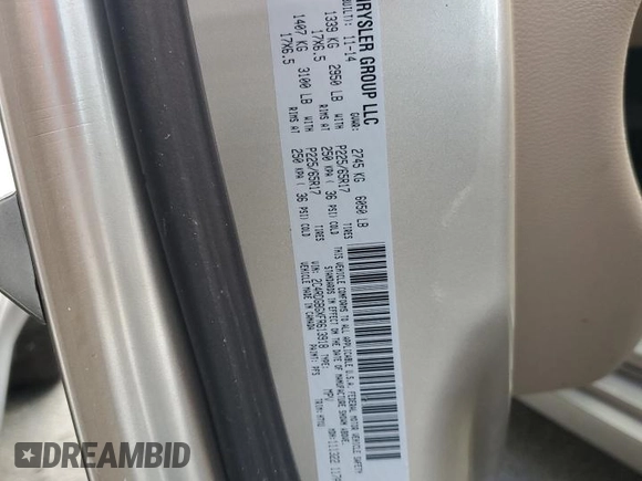 2015 Dodge Grand Caravan SE with VIN 2C4RDGBGXFR613918, listed as a Copart auction lot 75124864 with 27,822 mi miles and Salvage Title. Bid and sale history available at DreamBid. Image 14.