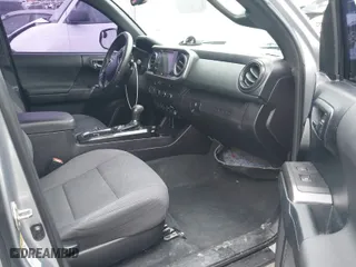 2016 Toyota Tacoma SR with VIN 3TMCZ5ANXGM010164, listed as a IAAI auction lot 41802736 with 201,697 mi miles. Bid and sale history available at carsss.com. Image 5.