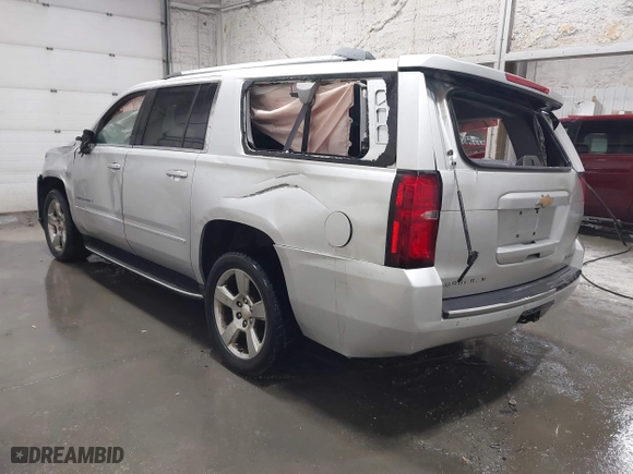 2017 Chevrolet Suburban Premier with VIN 1GNSKJKC0HR179235, listed as a IAAI auction lot 41301181 with 131,698 mi miles. Bid and sale history available at carsss.com. Image 3.