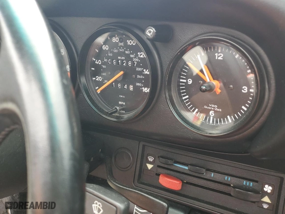 1987 Porsche 911 Carrera with VIN WP0EB0910HS161265, listed as a Copart auction lot 72954914 with 91,287 mi miles and Salvage Title. Bid and sale history available at carsss.com. Image 9.