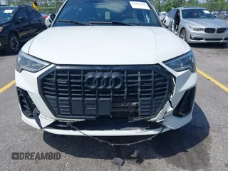 2021 Audi Q3 S line Premium Plus z VIN WA1EECF33M1024605, wystawiony jako IAAI lot #42062366 z przebiegiem 94 641 mil mil oraz . Historia ofert i sprzedaży dostępna na DreamBid. Obrazek 6.