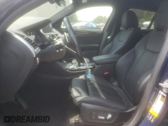 2019 BMW X4 xDrive30i with VIN 5UXUJ3C52KLG51818, listed as a Copart auction lot 59573625 with 77,841 mi miles and Salvage title. Bid and sale history available at DreamBid. Image 7.