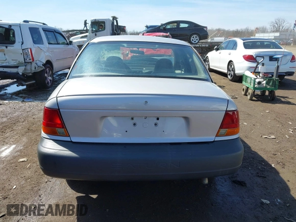 1999 Saturn SL z VIN 1G8ZH5281XZ376254, wystawiony jako IAAI lot #41857372 z przebiegiem 229 836 mil mil oraz . Historia ofert i sprzedaży dostępna na DreamBid. Obrazek 16.