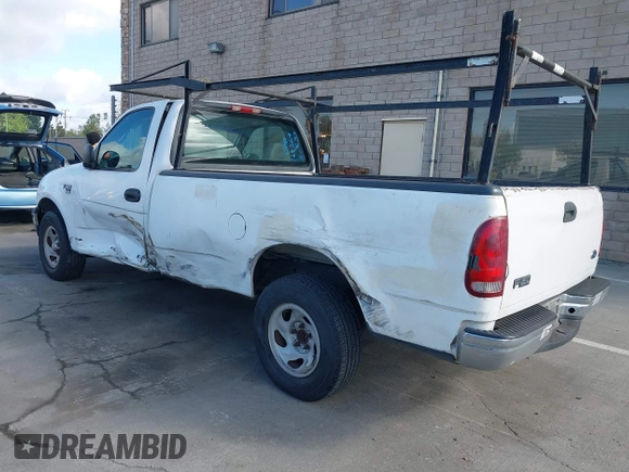 2000 Ford F-150 XL with VIN 1FTRF17WXYKA72880, listed as a IAAI auction lot 41989317 with 149,967 mi miles. Bid and sale history available at carsss.com. Image 3.