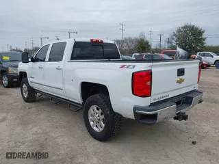 2015 Chevrolet Silverado 2500HD LTZ with VIN 1GC1KWE89FF149299, listed as a IAAI auction lot 41565330 with 249,551 mi miles. Bid and sale history available at carsss.com. Image 3.