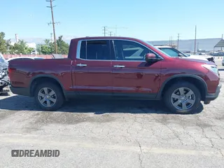 2020 Honda Ridgeline RTL-E with VIN 5FPYK3F7XLB014875, listed as a IAAI auction lot 42620537 with 41,919 mi miles and . Bid and sale history available at DreamBid. Image 14.