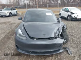 2023 Tesla Model 3 with VIN 5YJ3E1EAXPF693693, listed as a IAAI auction lot 41709704 with 12,473 mi miles and . Bid and sale history available at DreamBid. Image 12.
