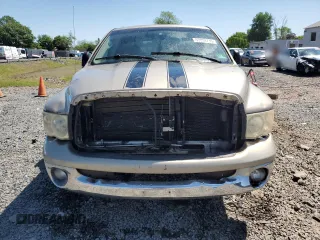 2002 Dodge 1500 z VIN 3D7HA18N42G195238, wystawiony jako Copart lot #57094715 z przebiegiem 185 931 mil mil oraz Szkoda całkowita • Salvage title. Historia ofert i sprzedaży dostępna na DreamBid. Obrazek 5.