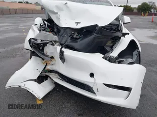2022 Tesla Model Y Performance with VIN 7SAYGDEFXNF384268, listed as a IAAI auction lot 41558359 with 33,870 mi miles and . Bid and sale history available at DreamBid. Image 6.