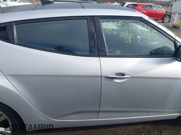 2017 Hyundai Veloster with VIN KMHTC6AD2HU324740, listed as a IAAI auction lot 41574415 with 66,685 mi miles. Bid and sale history available at carsss.com. Image 14.