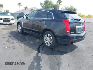 2014 Cadillac SRX Luxury Collection z VIN 3GYFNEE30ES650372, wystawiony jako IAAI lot #42195783 z przebiegiem 169 113 mil mil oraz . Historia ofert i sprzedaży dostępna na DreamBid. Obrazek 3.