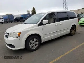 2012 Dodge Grand Caravan SXT with VIN 2C4RDGCG6CR204681, listed as a Copart auction lot 80799044 with 183,195 mi miles and Salvage Title. Bid and sale history available at DreamBid. Image 1.
