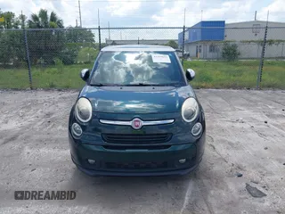 2014 FIAT 500L Lounge z VIN ZFBCFACH7EZ023283, wystawiony jako IAAI lot #42319623 z przebiegiem 129 414 mil mil oraz . Historia ofert i sprzedaży dostępna na DreamBid. Obrazek 6.