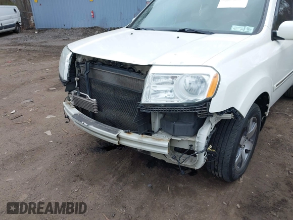 2013 Honda Pilot Touring with VIN 5FNYF4H96DB031577, listed as a IAAI auction lot 41699838 with 180,876 mi miles. Bid and sale history available at carsss.com. Image 6.
