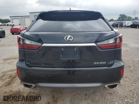 2017 Lexus RX 350 with VIN 2T2BZMCA9HC129460, listed as a Copart auction lot 57301995 with 163,128 mi miles and Salvage title. Bid and sale history available at DreamBid. Image 6.