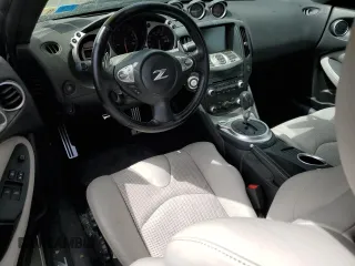 2010 Nissan 370Z with VIN JN1AZ4EH6AM505621, listed as a Copart auction lot 52745505 with 107,660 mi miles and Salvage Title. Bid and sale history available at carsss.com. Image 8.